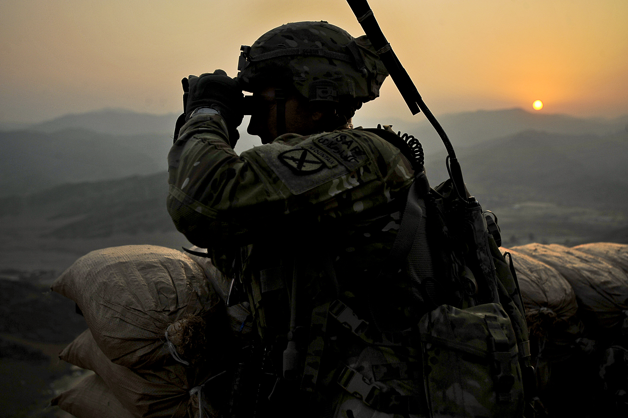 Staff Sergeant Shelby Johnson scans the horizon around FOB Torkham, Afghanistan, 2013 09 26.jpg