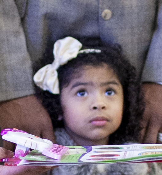 Young Gianna Bryant gazes up at President Barack Obama when her family met him on 26 January 2010.