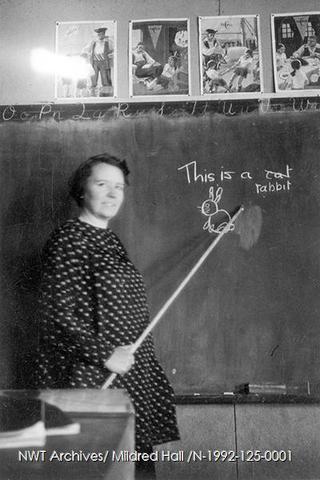Mildred Hall uses a blackboard, in 1939 - N-1992-125-0001 142.jpg